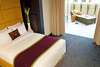 This upscale boutique hotel is located in the Victory Park district of Dallas, Texas.  A rooftop infinity-edge swimming pool and 24-hour concierge service are featured on location.